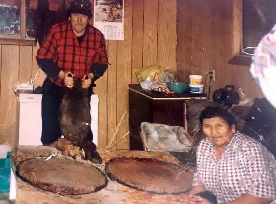 My Grandparents ... Eve and Joseph Keeper, stretching beaver pelts.